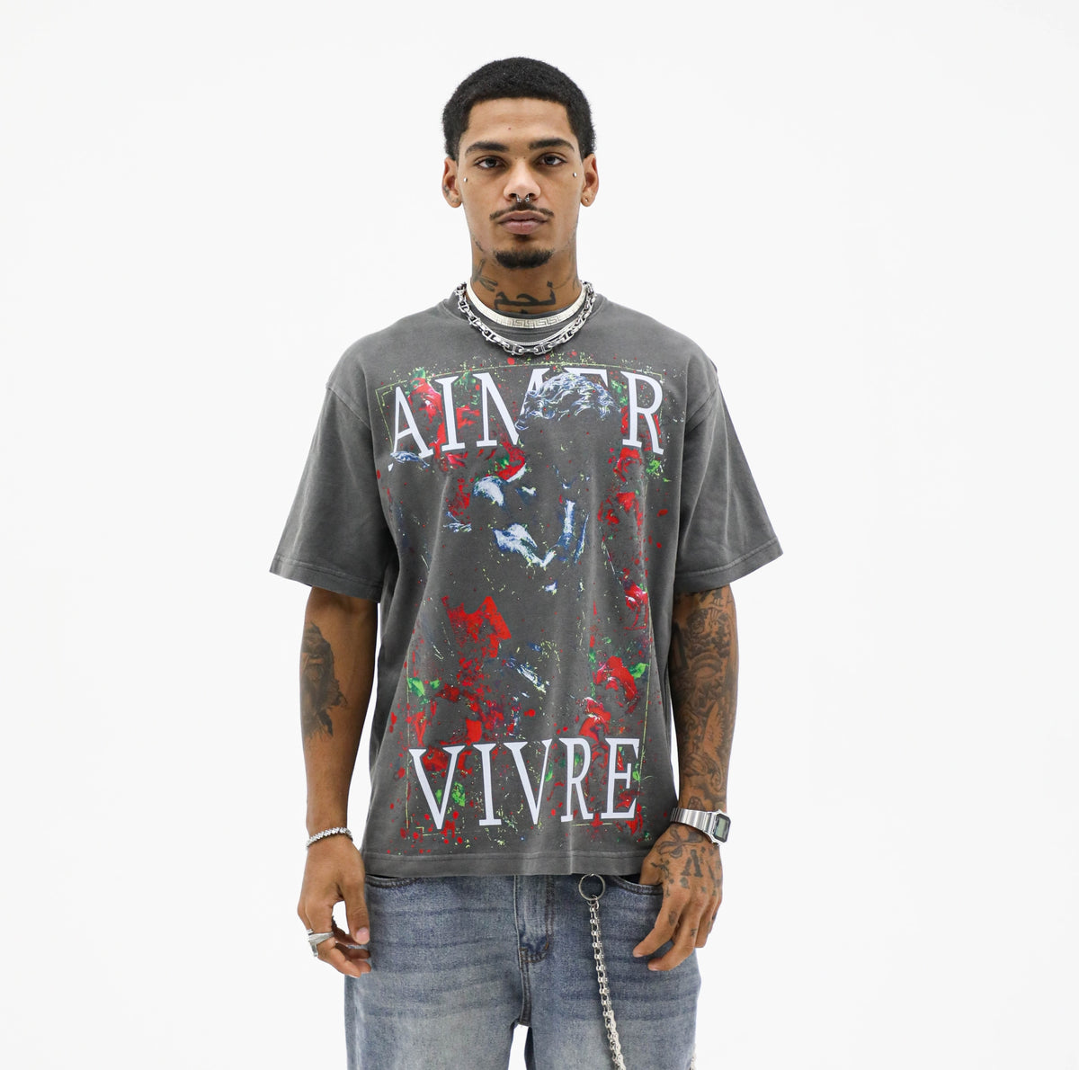 Model wearing the vintage black Eros & Roses Rhinestone Tee with statue and red roses graphic